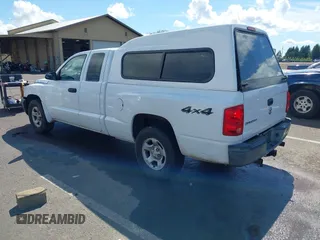 2005 Dodge Dakota ST with VIN 1D7HW22K15S119947, listed as a IAAI auction lot 42372148 with 140,528 mi miles and . Bid and sale history available at DreamBid. Image 3.