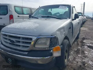 1999 Ford F-150 Work Series with VIN 1FTZF1726XNB02953, listed as a IAAI auction lot 41565566 with 180,775 mi miles. Bid and sale history available at carsss.com. Image 17.