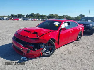2019 Dodge Charger SRT Hellcat with VIN 2C3CDXL90KH635808, listed as a IAAI auction lot 41679587 with 43,940 mi miles and . Bid and sale history available at DreamBid. Image 2.