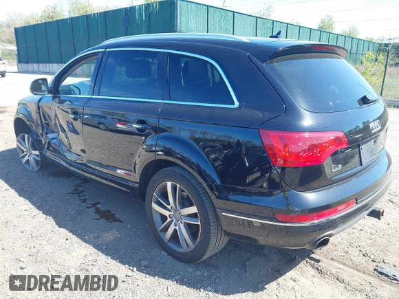 2014 Audi Q7 Premium Plus with VIN WA1LGAFE5ED014701, listed as a IAAI auction lot 42107552 with 98,919 mi miles and . Bid and sale history available at DreamBid. Image 3.