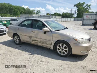 2005 Toyota Camry LE with VIN 4T1BF30K15U603142, listed as a Copart auction lot 54925905 with 295,376 mi miles and Clean Title. Bid and sale history available at DreamBid. Image 4.