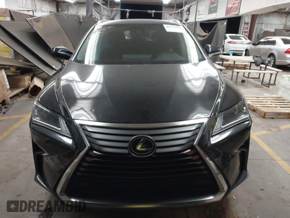 2018 Lexus RX with VIN JTJGZKCA2J2004185, listed as a IAAI auction lot 41773902 with 52,988 mi miles. Bid and sale history available at carsss.com. Image 12.
