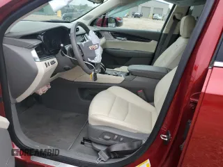 2021 Cadillac XT6 Premium Luxury with VIN 1GYKPCRSXMZ218341, listed as a Copart auction lot 56046145 with 35,270 mi miles and Salvage title. Bid and sale history available at DreamBid. Image 7.