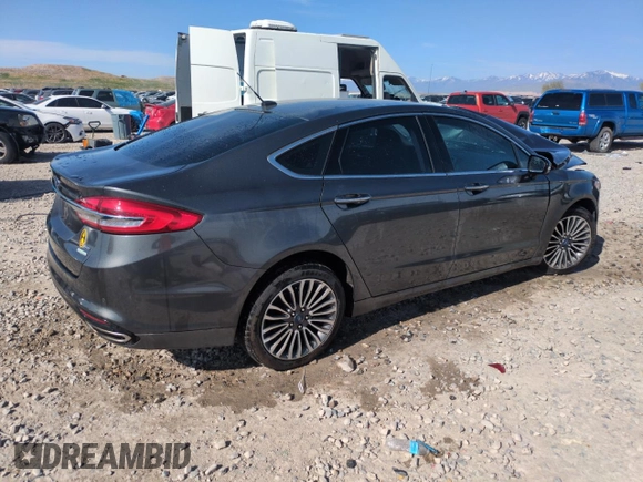 2017 Ford Fusion SE z VIN 3FA6P0H98HR350163, wystawiony jako Copart lot #54196545 z przebiegiem Nie podano mil oraz Szkoda całkowita • Salvage title. Historia ofert i sprzedaży dostępna na DreamBid. Obrazek 3.