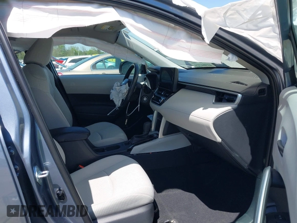 2024 Toyota Corolla Cross L with VIN 7MUAAABGXRV092221, listed as a IAAI auction lot 41984725 with 12,699 mi miles and . Bid and sale history available at DreamBid. Image 5.