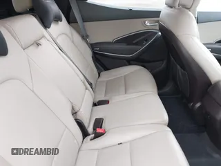 2018 Hyundai Santa Fe 2.4L z VIN 5XYZUDLB1JG543837, wystawiony jako IAAI lot #42235471 z przebiegiem 157 909 mil mil oraz . Historia ofert i sprzedaży dostępna na DreamBid. Obrazek 8.