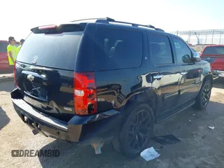 2011 Chevrolet Tahoe LT with VIN 1GNSCBE08BR183366, listed as a IAAI auction lot 42343281 with 211,674 mi miles and . Bid and sale history available at DreamBid. Image 4.