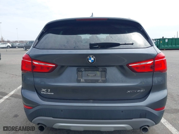 2019 BMW X1 xDrive28i with VIN WBXHT3C51K5L90571, listed as a IAAI auction lot 41909209 with 35,902 mi miles. Bid and sale history available at carsss.com. Image 16.
