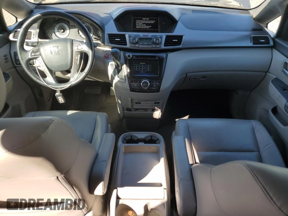 2014 Honda Odyssey Touring with VIN 5FNRL5H96EB061876, listed as a Copart auction lot 49759935 with 132,591 mi miles and Salvage Title. Bid and sale history available at DreamBid. Image 8.