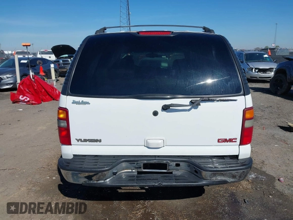 2003 GMC Yukon SLT with VIN 1GKEC13Z13J197955, listed as a IAAI auction lot 41586841 with 208,752 mi miles. Bid and sale history available at carsss.com. Image 19.