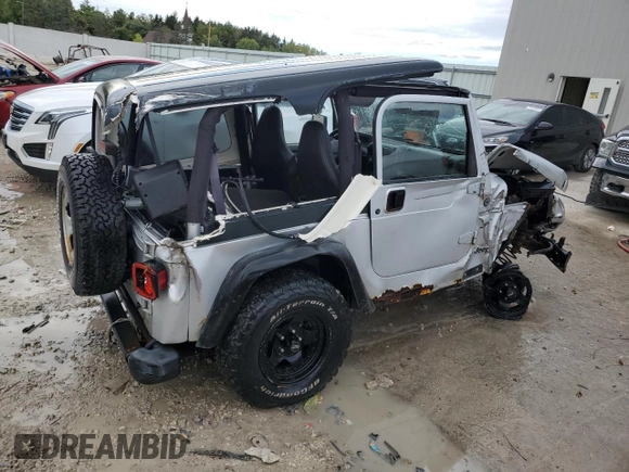 2002 Jeep Wrangler Sport with VIN 1J4FA49S32P733909, listed as a Copart auction lot 72776204 with 157,508 mi miles and Non Repairable. Bid and sale history available at carsss.com. Image 3.
