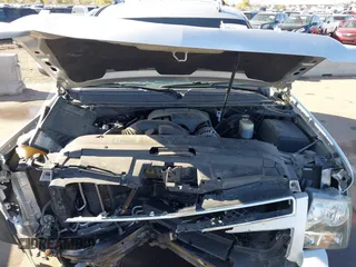 2013 Chevrolet Tahoe LT with VIN 1GNSKBE01DR157083, listed as a IAAI auction lot 41759189 with 153,403 mi miles and . Bid and sale history available at DreamBid. Image 10.