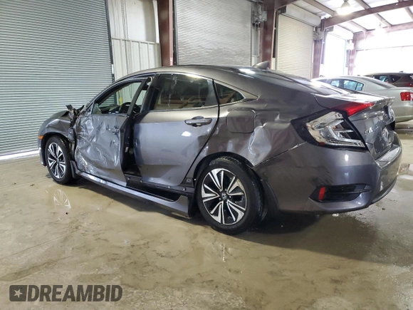 2017 Honda Civic EX-T with VIN 19XFC1E33HE002225, listed as a Copart auction lot 79443224 with 138,738 mi miles and Salvage Title. Bid and sale history available at DreamBid. Image 2.