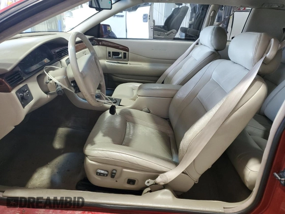 1996 Cadillac Eldorado z VIN 1G6EL12Y3TU620055, wystawiony jako Copart lot #72387994 z przebiegiem 128 641 mil mil oraz Czysty tytuł • Clean title. Historia ofert i sprzedaży dostępna na DreamBid. Obrazek 7.
