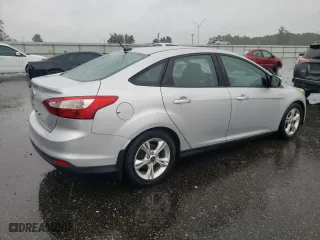 2014 Ford Focus SE with VIN 1FADP3F22EL103956, listed as a Copart auction lot 71005344 with 102,509 mi miles and Salvage Title. Bid and sale history available at carsss.com. Image 3.