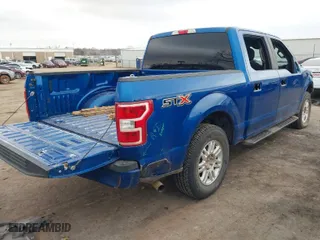 2018 Ford F-150 XL with VIN 1FTEW1CPXJKF74789, listed as a IAAI auction lot 41520205 with 145,658 mi miles. Bid and sale history available at carsss.com. Image 4.
