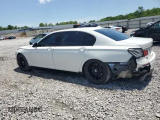 2015 BMW 7 Series 740Li z VIN WBAYE4C5XFD947323, wystawiony jako Copart lot #56962915 z przebiegiem 77 956 mil mil oraz Szkoda całkowita • Salvage title. Historia ofert i sprzedaży dostępna na DreamBid. Obrazek 2.