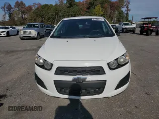 2012 Chevrolet Sonic LT z VIN 1G1JD6SB5C4229712, wystawiony jako Copart lot #81492374 z przebiegiem 116 566 mil mil oraz Czysty tytuł • Clean title. Historia ofert i sprzedaży dostępna na DreamBid. Obrazek 5.