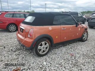 2006 MINI Convertible with VIN WMWRF335X6TG15824, listed as a Copart auction lot 56163205 with 113,109 mi miles and Salvage title. Bid and sale history available at DreamBid. Image 3.