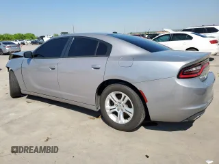 2015 Dodge Charger SE with VIN 2C3CDXBG1FH740962, listed as a Copart auction lot 52035565 with 241,253 mi miles and Salvage Title. Bid and sale history available at carsss.com. Image 2.