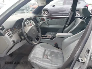 1997 Mercedes-Benz E-Class with VIN WDBJF55FXVJ033553, listed as a IAAI auction lot 41425117 with 280,019 mi miles. Bid and sale history available at carsss.com. Image 5.
