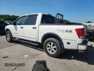 2012 Nissan Titan SL with VIN 1N6BA0EC9CN324495, listed as a Copart auction lot 60982445 with 142,430 mi miles and Salvage title. Bid and sale history available at DreamBid. Image 2.