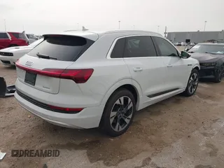 2022 Audi e-tron Premium Plus with VIN WA1LAAGE6NB033284, listed as a IAAI auction lot 41784457 with 30,964 mi miles and . Bid and sale history available at DreamBid. Image 4.
