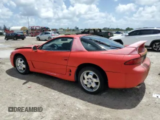 1999 Mitsubishi 3000GT GT z VIN JA3AM84J4XY001608, wystawiony jako Copart lot #64366944 z przebiegiem 153 804 mil mil oraz Tytuł czysty. Historia ofert i sprzedaży dostępna na DreamBid. Obrazek 2.