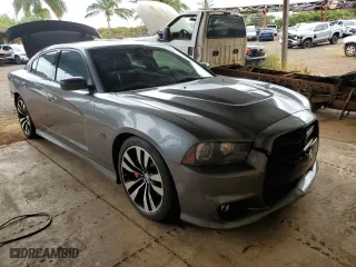 2012 Dodge Charger SRT8 with VIN 2C3CDXEJ1CH240058, listed as a Copart auction lot 73943004 with 72,013 mi miles and Salvage Title. Bid and sale history available at carsss.com. Image 4.