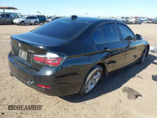 2012 BMW 3 Series 328i with VIN WBA3A5C58CF343636, listed as a IAAI auction lot 41832374 with 136,968 mi miles. Bid and sale history available at carsss.com. Image 4.