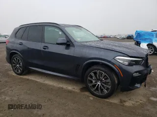 2021 BMW X5 sDrive40i with VIN 5UXCR4C01M9E98458, listed as a Copart auction lot 44289113 with 26,672 mi miles. Bid and sale history available at carsss.com. Image 4.