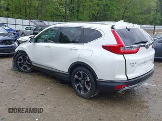 2018 Honda CR-V Touring z VIN 5J6RW1H96JL014087, wystawiony jako IAAI lot #41931640 z przebiegiem Nie podano mil oraz . Historia ofert i sprzedaży dostępna na DreamBid. Obrazek 3.