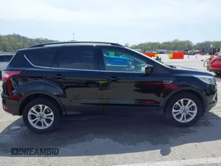 2017 Ford Escape SE with VIN 1FMCU9GD4HUE72510, listed as a IAAI auction lot 41932364 with 115,991 mi miles. Bid and sale history available at carsss.com. Image 13.
