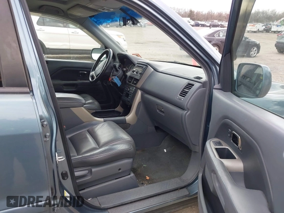 2006 Honda Pilot EX-L with VIN 2HKYF18566H517113, listed as a IAAI auction lot 41917755 with 180,398 mi miles and . Bid and sale history available at DreamBid. Image 5.