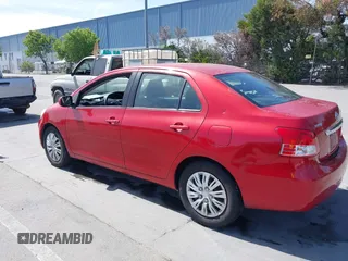 2009 Toyota Yaris with VIN JTDBT903591342243, listed as a IAAI auction lot 42104557 with 407,106 mi miles. Bid and sale history available at carsss.com. Image 3.