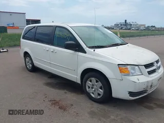 2009 Dodge Grand Caravan SE z VIN 2D8HN44E49R575627, wystawiony jako IAAI lot #42561897 z przebiegiem 94 931 mil mil oraz . Historia ofert i sprzedaży dostępna na DreamBid. Obrazek 1.