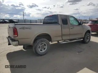 2001 Ford F-150 XL with VIN 1FTRX18L01KE64063, listed as a Copart auction lot 51500775 with 326,070 mi miles and Salvage title. Bid and sale history available at DreamBid. Image 3.
