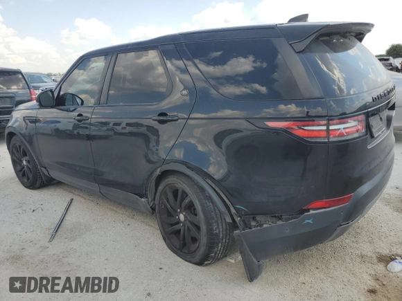 2018 Land Rover Discovery HSE with VIN SALRR2RV3JA051990, listed as a Copart auction lot 74060534 with 104,086 mi miles and Salvage Title. Bid and sale history available at carsss.com. Image 2.