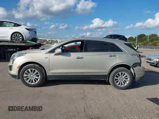 2017 Cadillac XT5 FWD with VIN 1GYKNARS0HZ174625, listed as a IAAI auction lot 41520634 with 116,169 mi miles. Bid and sale history available at carsss.com. Image 15.