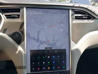 2013 Tesla Model S with VIN 5YJSA1CN0DFP21851, listed as a IAAI auction lot 42557791 with 106,328 mi miles and . Bid and sale history available at DreamBid. Image 19.