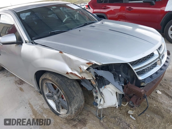 2012 Dodge Avenger SXT with VIN 1C3CDZCB2CN195212, listed as a IAAI auction lot 41374232 with 107,973 mi miles and . Bid and sale history available at DreamBid. Image 12.