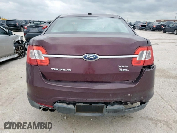 2011 Ford Taurus SEL z VIN 1FAHP2EW6BG183640, wystawiony jako Copart lot #54662745 z przebiegiem 149 309 mil mil oraz Szkoda całkowita • Salvage title. Historia ofert i sprzedaży dostępna na DreamBid. Obrazek 6.