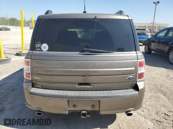 2014 Ford Flex SEL z VIN 2FMGK5C8XEBD43259, wystawiony jako Copart lot #56129285 z przebiegiem 142 203 mil mil oraz Szkoda całkowita • Salvage title. Historia ofert i sprzedaży dostępna na DreamBid. Obrazek 6.