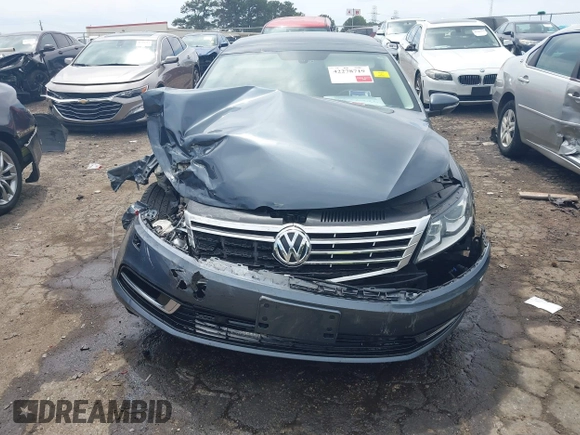2013 Volkswagen CC Executive z VIN WVWGU7AN8DE520610, wystawiony jako IAAI lot #42278719 z przebiegiem 197 905 mil mil oraz . Historia ofert i sprzedaży dostępna na DreamBid. Obrazek 6.