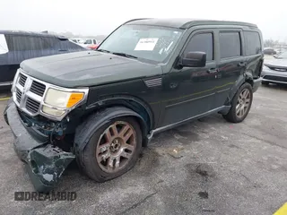 2010 Dodge Nitro SE with VIN 1D4PU2GK1AW141697, listed as a IAAI auction lot 41380951 with 131,322 mi miles and . Bid and sale history available at DreamBid. Image 2.