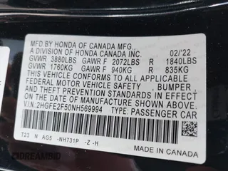 2022 Honda Civic Sport with VIN 2HGFE2F50NH569994, listed as a IAAI auction lot 41944064 with 60,614 mi miles. Bid and sale history available at carsss.com. Image 9.