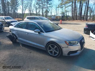 2016 Audi A3 1.8T Premium with VIN WAUA7GFF0G1030802, listed as a IAAI auction lot 41405584 with 87,216 mi miles. Bid and sale history available at carsss.com. Image 1.