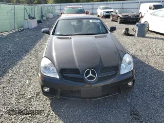 2009 Mercedes-Benz SLK-Class 3.0L with VIN WDBWK54F79F190128, listed as a Copart auction lot 80048934 with 32,354 mi miles and Salvage Title. Bid and sale history available at carsss.com. Image 5.