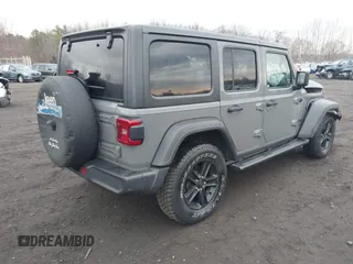 2021 Jeep Wrangler Unlimited Sport S with VIN 1C4HJXDG5MW614688, listed as a IAAI auction lot 41678964 with 89,309 mi miles. Bid and sale history available at carsss.com. Image 4.