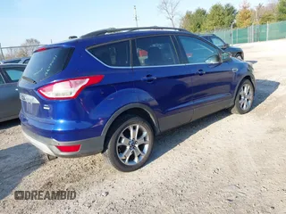2013 Ford Escape SEL with VIN 1FMCU9HX5DUB24167, listed as a IAAI auction lot 41789266 with 130,608 mi miles. Bid and sale history available at carsss.com. Image 4.